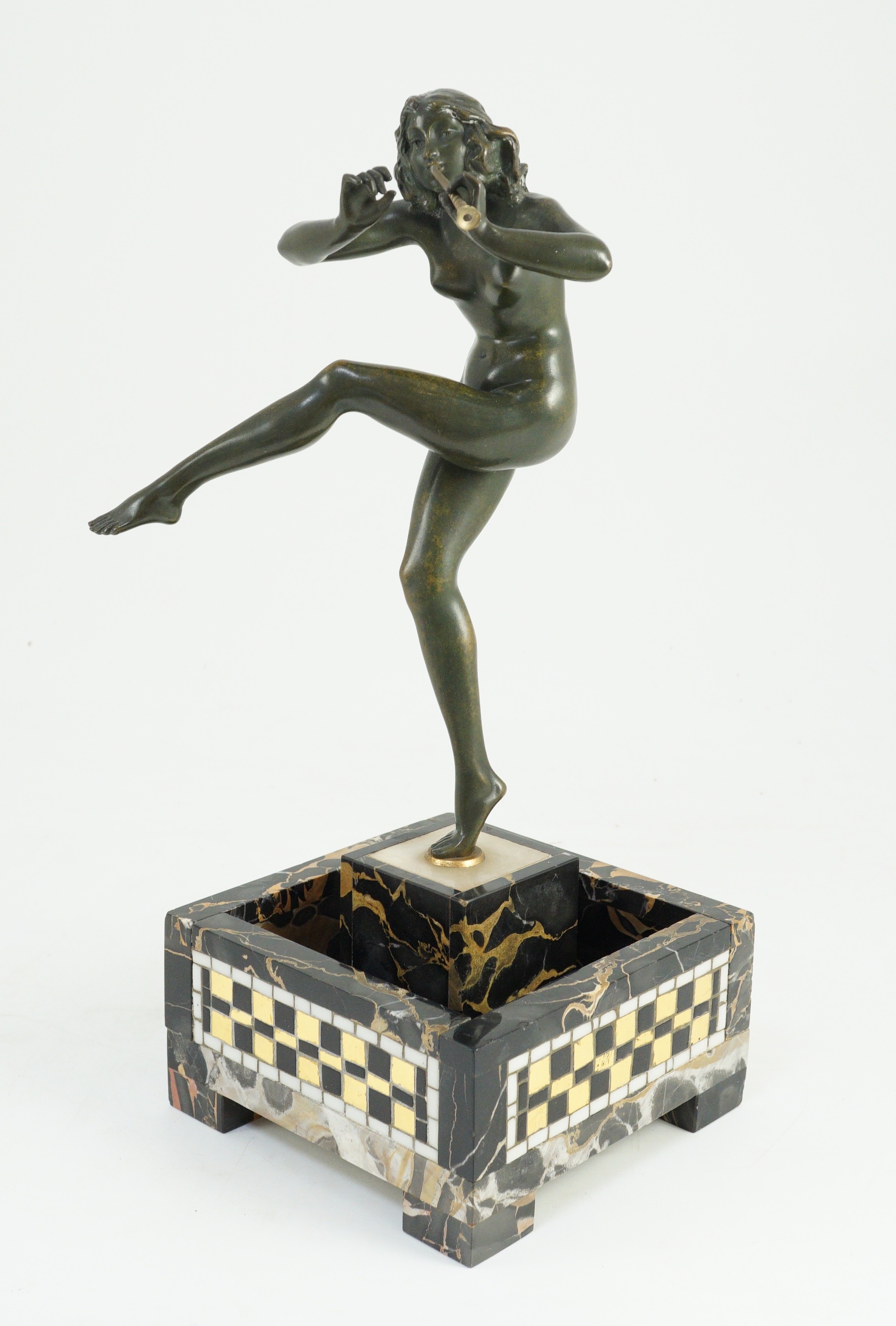 Pierre Le Faguays (1892-1962). An Art Deco bronze figure of a female pan piper, 15cm wide 37cm high overall